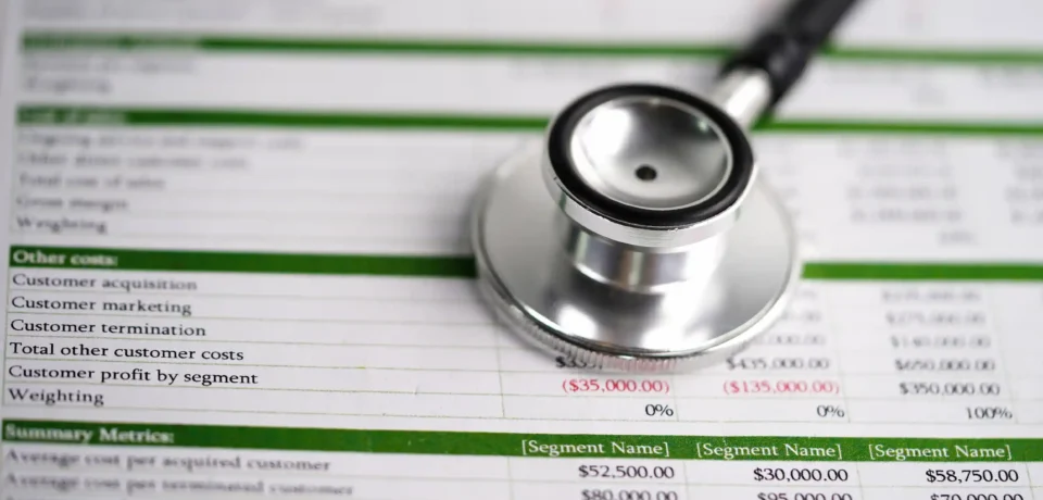 stethoscope-on-spreadsheet-paper-finance-2025-02-24-17-50-57-utc 1