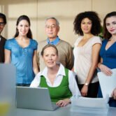 Portrait of group of people in office