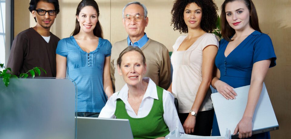 Portrait of group of people in office