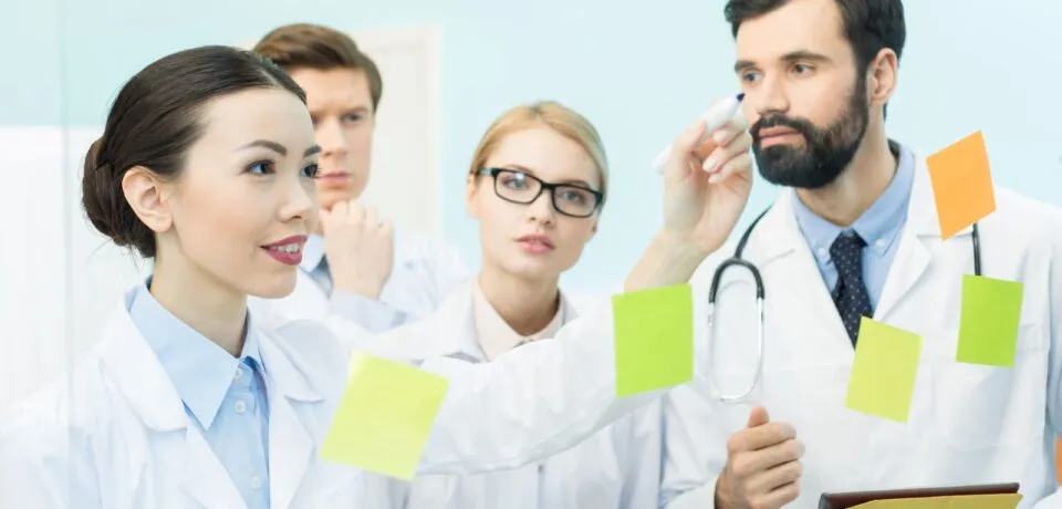 group-of-confident-doctors-having-work-meeting-2024-11-08-07-19-25-utc (1)
