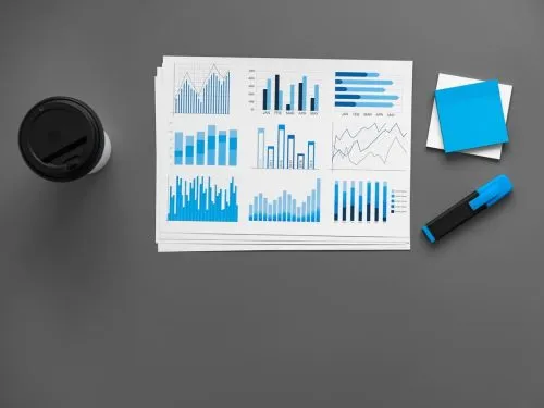 financial-paper-with-charts-and-diagrams-on-gray-t-2025-02-25-02-12-39-utc (1) (2)