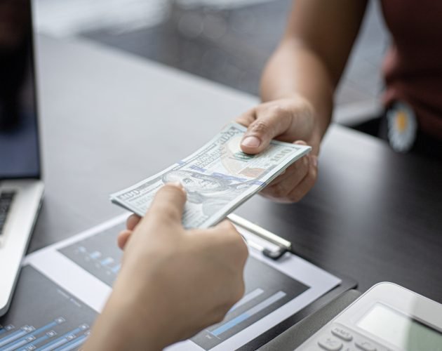 giving-money-2025-03-05-06-47-15-utc Counting money, businessmen have analyzed between cash and credit card which is consistent and convenient to spend in the present day.